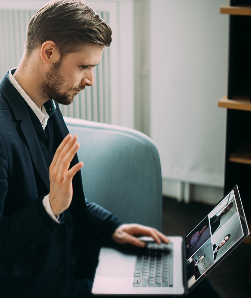 Photo of a man on a Zoom business call
