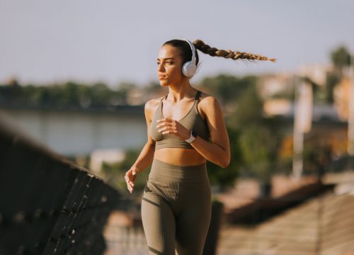 Photo of a woman jogging in the city